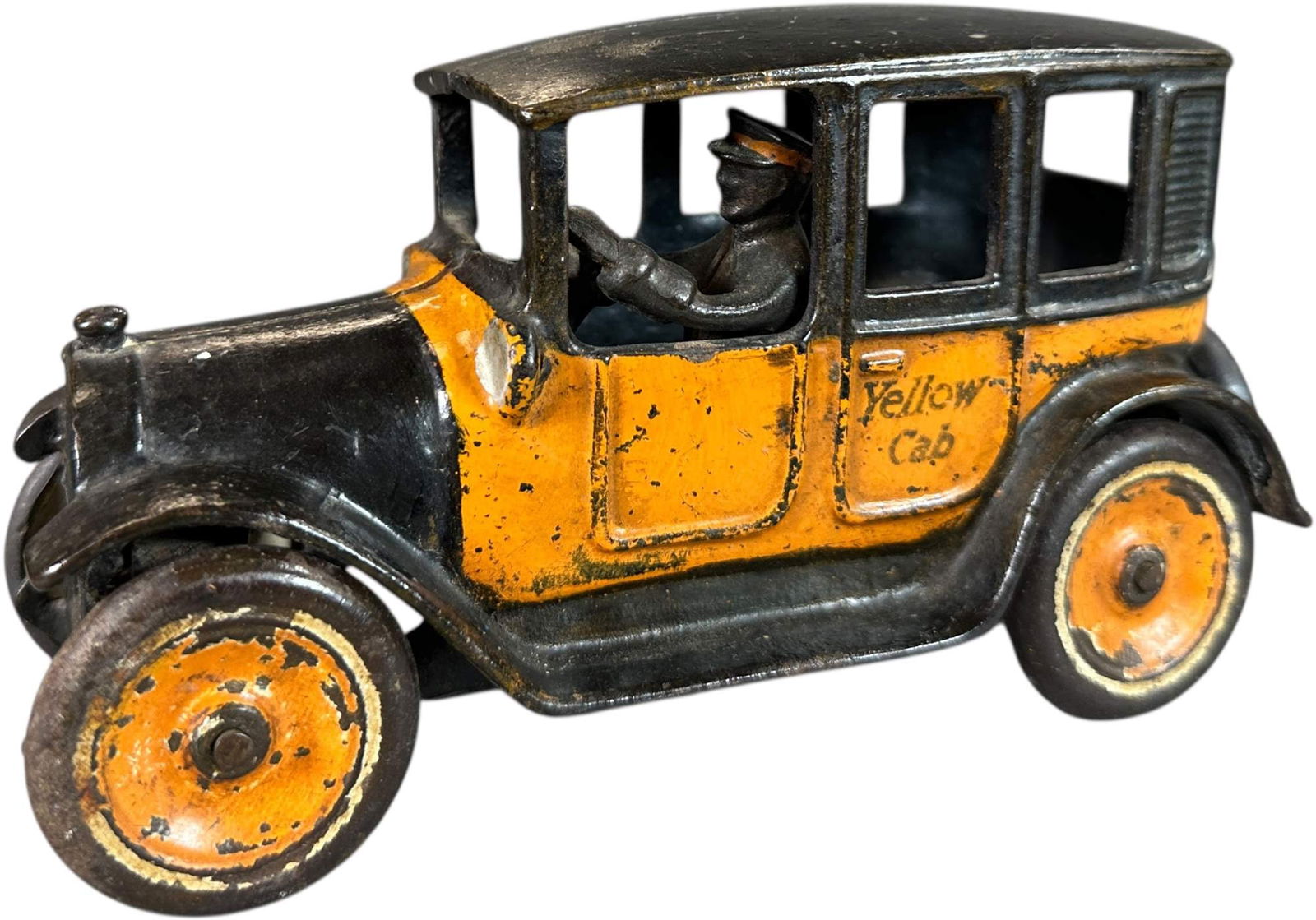 ARCADE YELLOW CAB TAXI: 31. ARCADE YELLOW CAB TAXI | 7.5" l. | Original paint preserved with a clear lacquer, (Very Good Condition) | $200 - $400