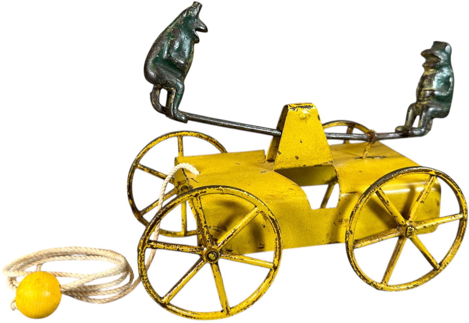 FROGS ON SEE-SAW PULL TOY: 68. FROGS ON SEE-SAW PULL TOY | 7" l. | (Very Good to Excellent Condition) | $200 - $400