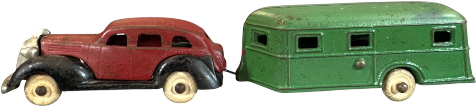 KENTON 1936 PONTIAC SEDAN W/ HOUSE TRAILER: 79. KENTON 1936 PONTIAC SEDAN W/ HOUSE TRAILER | Ex: Tony Lasala Collection. | 9" l. | A polishing would brighten this up wonderfully, (Excellent Condition) | $400 - $700