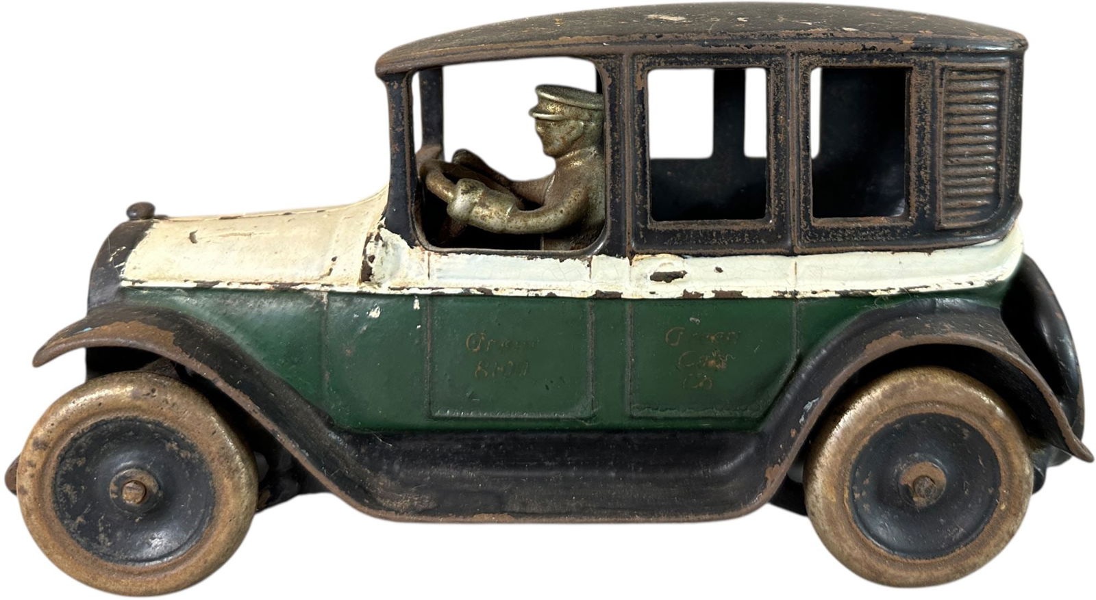 ARCADE GREEN & WHITE TAXI CAB CO: 81. ARCADE GREEN & WHITE TAXI CAB CO | Ex: Tony Lasala Collection. | 8.5" l. | Original paint in (Very Good to Excellent Condition) | $400 - $800