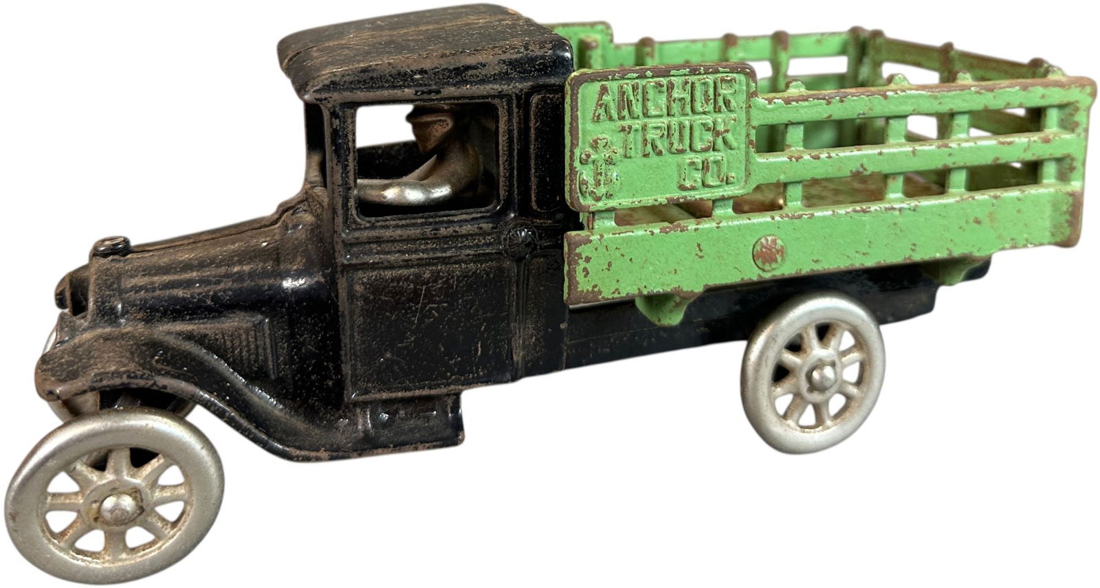 NORTH & JUDD ANCHOR TRUCK CO: 87. NORTH & JUDD ANCHOR TRUCK CO | Seldom found with green body. Ex: Tony Lasala Collection. | 9" l. | Some casting flaws to spokes, (Very Good Condition) | $400 - $700