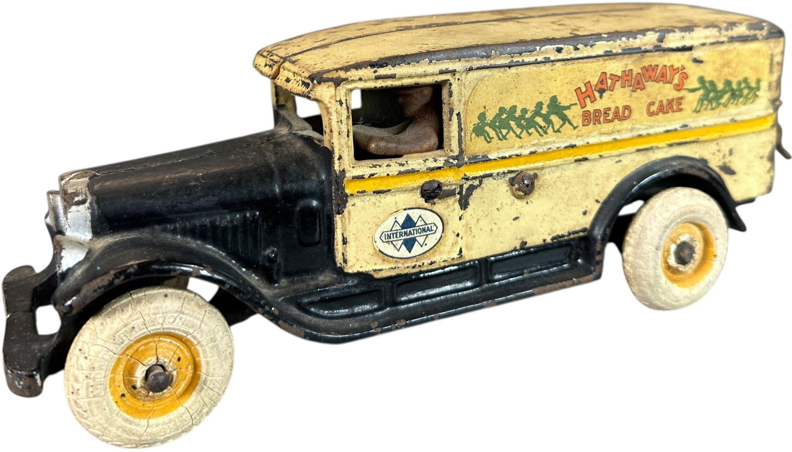 ARCADE HATHAWAYS BREAD TRUCK: 93. ARCADE HATHAWAYS BREAD TRUCK | Ex: Tony Lasala Collection. | 9" l. | Age appropriate wear to an all original truck, (Very Good Condition) | $400 - $700