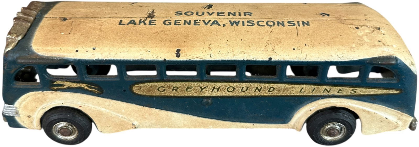 ARCADE GREYHOUND LAKE GENEVA BUS: 101. ARCADE GREYHOUND LAKE GENEVA BUS | Private label souvenir roof. Ex: Tony Lasala Collection. | 9" l. | Needs a cleaning, (Very Good Condition) | $300 - $600