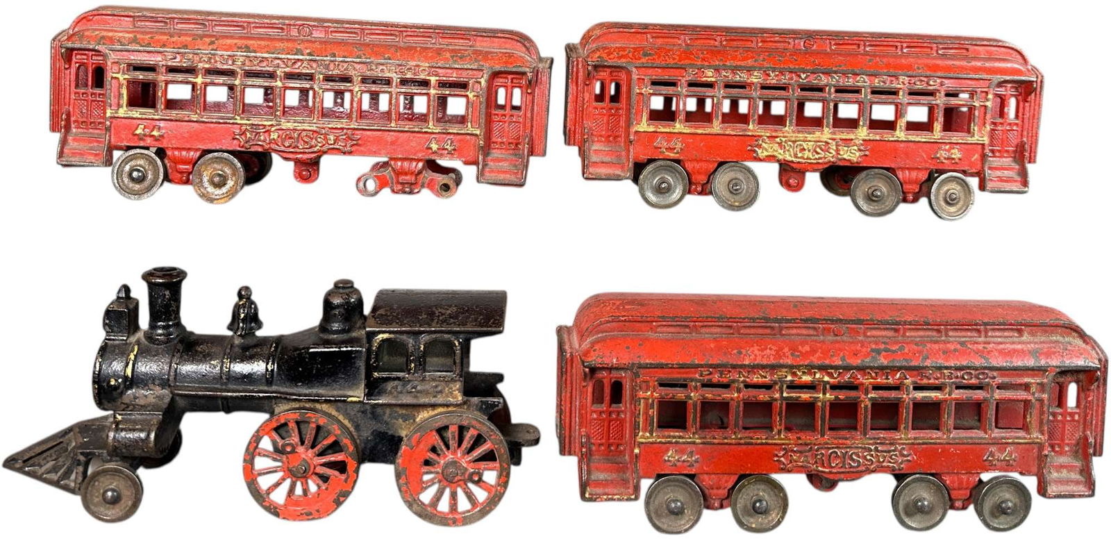 HUBLEY PRR NARCISSUS FLOOR TRAIN: 128. HUBLEY PRR NARCISSUS FLOOR TRAIN | 10" l. loco | One car has chipped end frame and is missing wheels, otherwise complete and original (Very Good to Excellent Condition) | $300 - $600