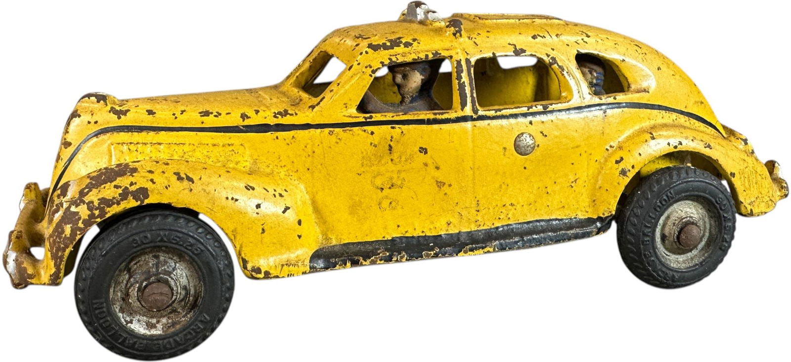 ARCADE 1940S YELLOW CAB: 134. ARCADE 1940S YELLOW CAB | 8" l. | Original paint, clicker bar absent, (Very Good Condition) | $200 - $400