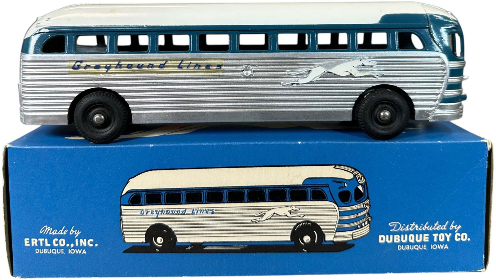 BOXED ERTL ALUMINUM GREYHOUND BUS: 173. BOXED ERTL ALUMINUM GREYHOUND BUS | 9.5" l. | (Pristine Condition) | $100 - $200