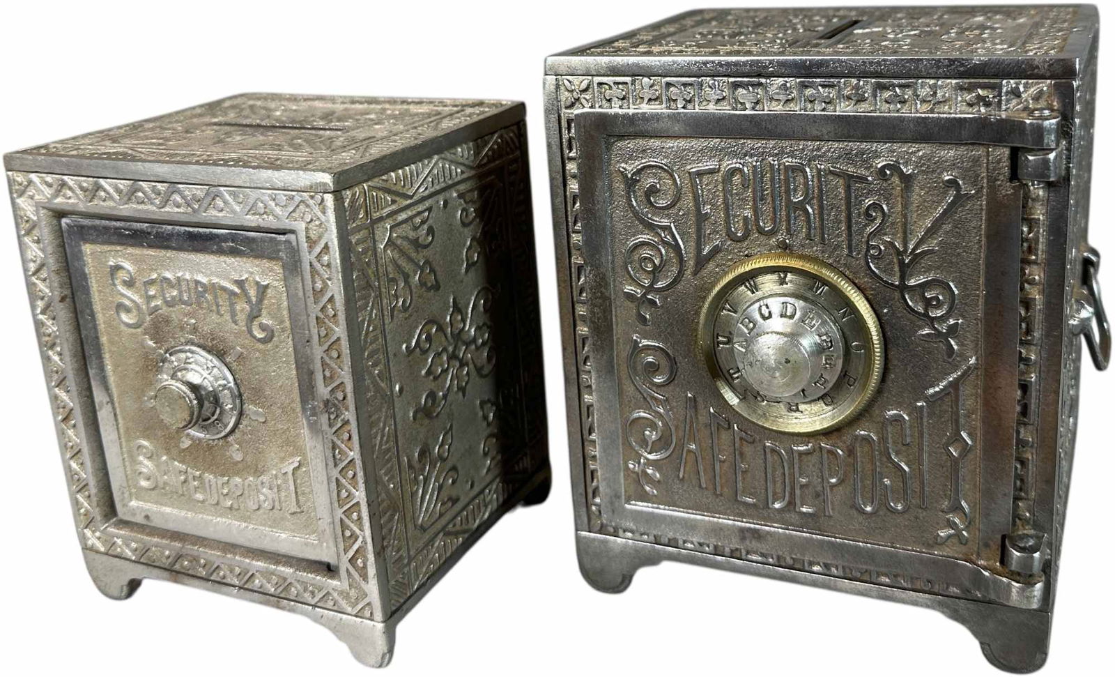 TWO NICKEL PLATED SECURITY SAFE STILL BANKS: 206. TWO NICKEL PLATED SECURITY SAFE STILL BANKS | Kyser & Rex. | 5.5" h. | (Excellent Condition) | $200 - $400