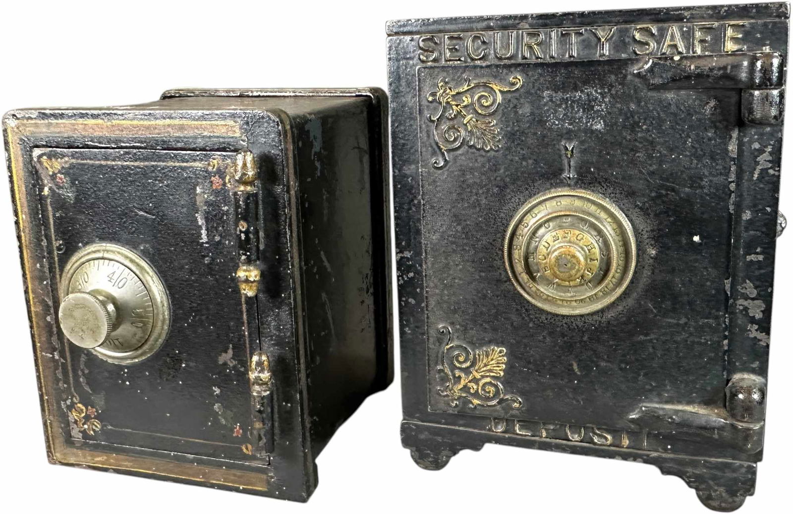 TWO LG SAFE STILL BANKS: 209. TWO LG SAFE STILL BANKS | Kyser & Rex and Eagle Lock Co. | 8" h. | Security safe missing one inner drawer and steel ring in lion's mouth, (Very Good Condition) | $200 - $400