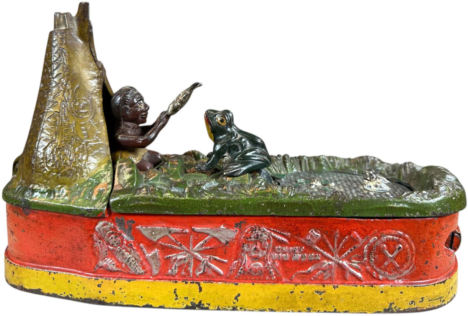 CHIEF BIG MOON MECHANICAL BANK: 224. CHIEF BIG MOON MECHANICAL BANK | J&E Stevens Co., very desirable bright color red base version of this popular bank. | 10" l. | Nice original example which could brighten up with a little oil/pol