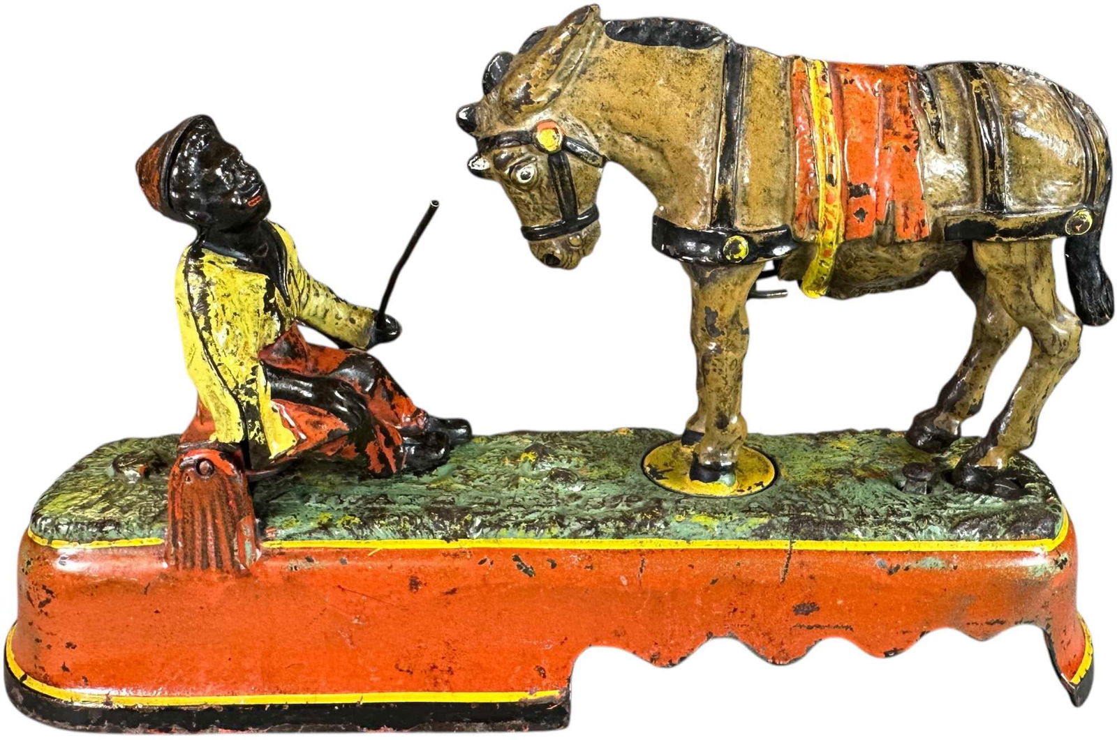 SPISE A MULE MECHANICAL BANK - BENCH: 234. SPISE A MULE MECHANICAL BANK - BENCH | J&E Stevens Co. Desirable yellow shirt version. | CULTURAL DISCLAIMER: Certain antique and vintage items in this sale include imagery or themes that