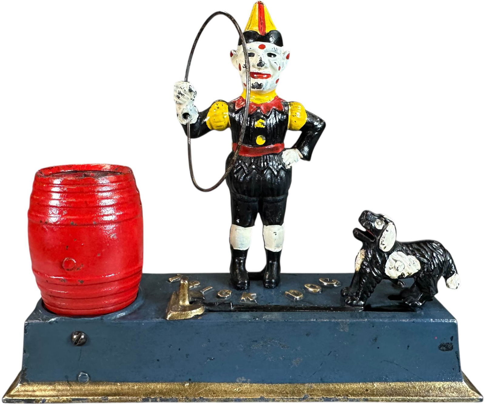 TRICK DOG MECHANICAL BANK: 242. TRICK DOG MECHANICAL BANK | Hubley, Lancaster PA. | 9" l. | Two spots of black touch-up on clown only visible under blacklight, otherwise (Pristine Condition) | $250 - $500