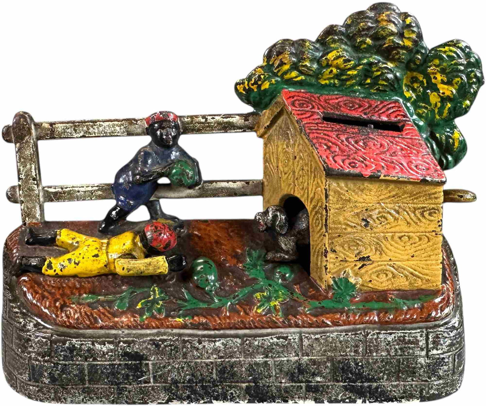 BOYS STEALING WATERMELON MECHANICAL BANK: 285. BOYS STEALING WATERMELON MECHANICAL BANK | Kyser & Rex Mfg. Co. | CULTURAL DISCLAIMER: Certain antique and vintage items in this sale include imagery or themes that reflect racial stereotypes