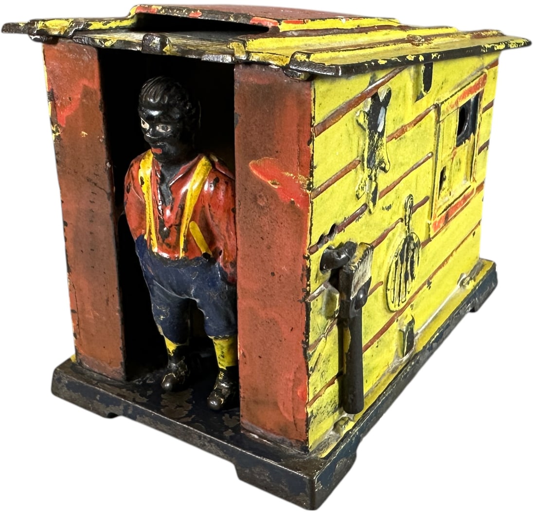 CABIN MECHANICAL BANK: 314. CABIN MECHANICAL BANK | J&E Stevens Co. | CULTURAL DISCLAIMER: Certain antique and vintage items in this sale include imagery or themes that reflect racial stereotypes now recognized as offensive