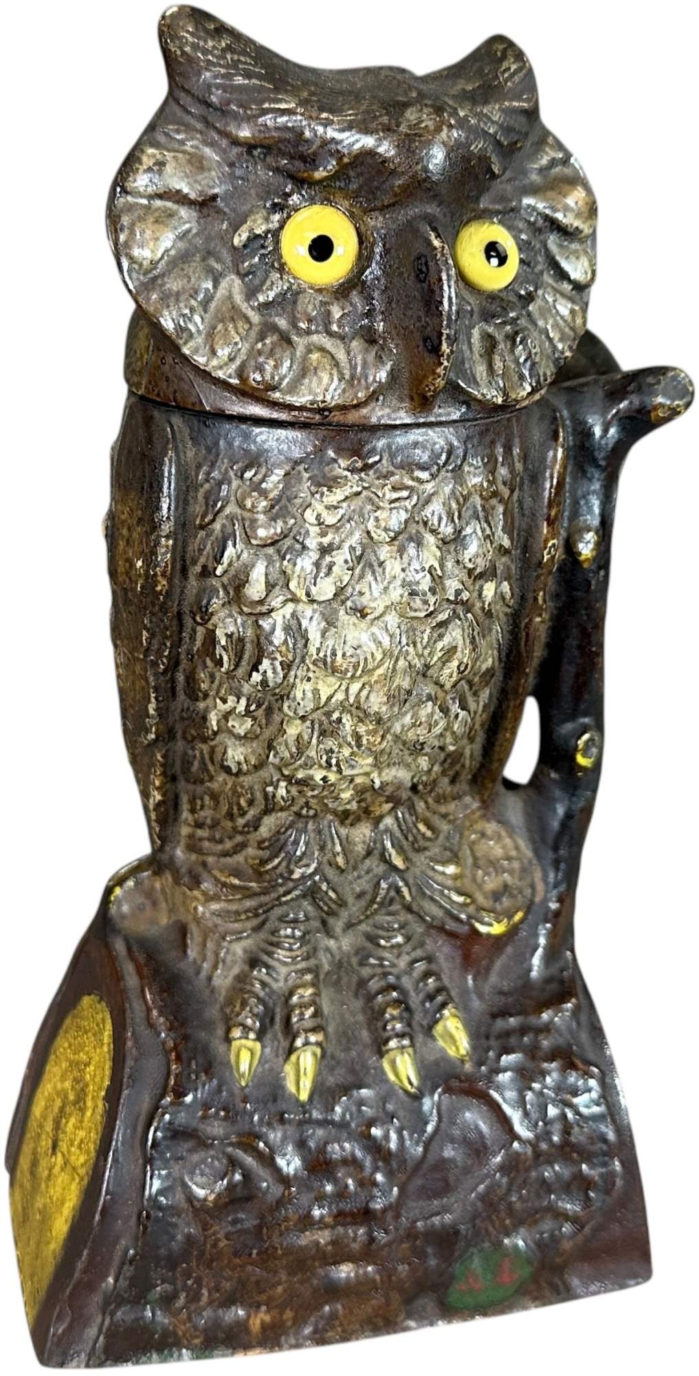 OWL TURNS HEAD MECHANICAL BANK: 346. OWL TURNS HEAD MECHANICAL BANK | J&E Stevens Co. | 7.5" h. | (Excellent Condition) with a lot of red paint retained on the lever. | $300 - $600