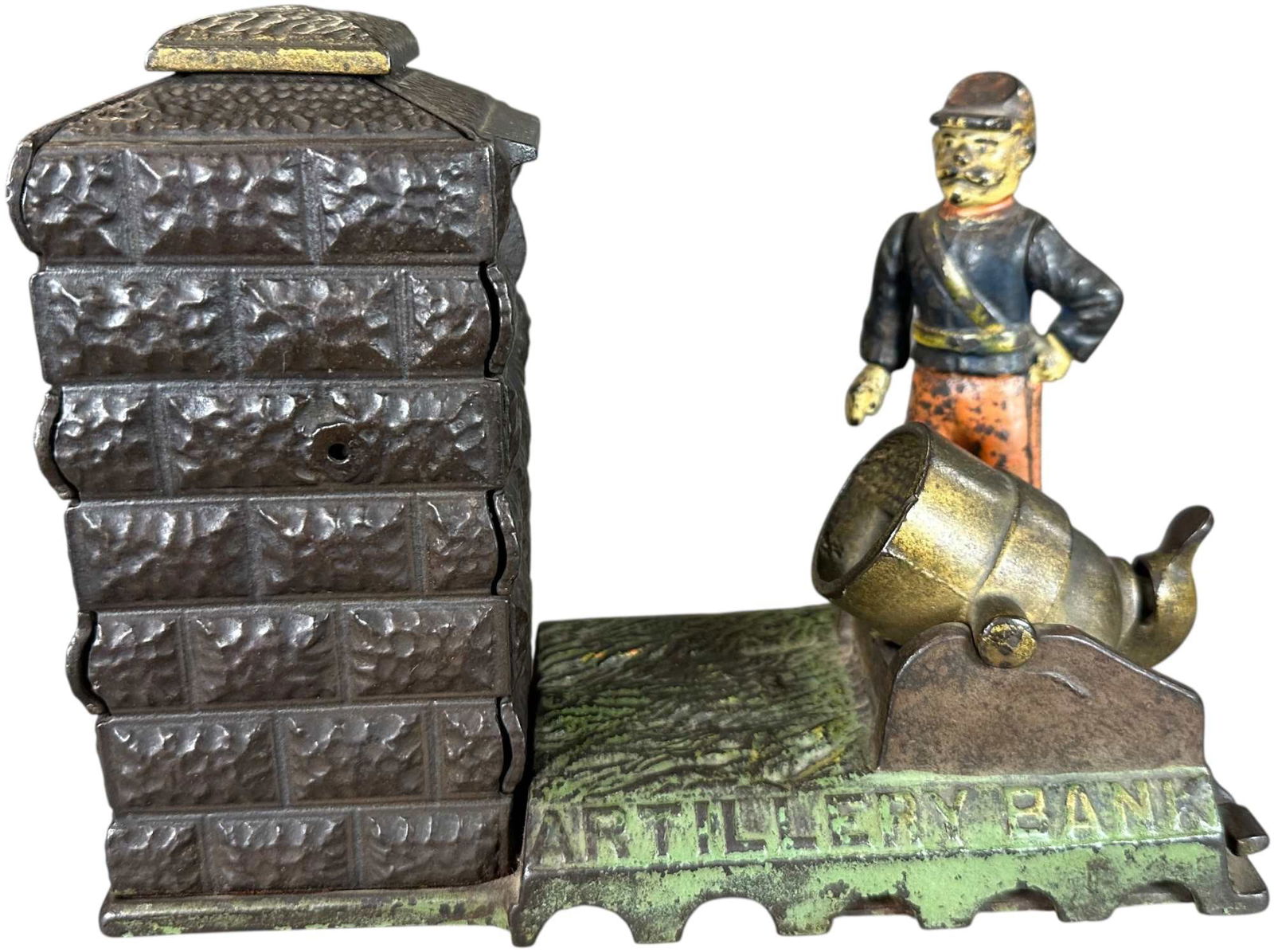 ARTILLERY MECHANICAL BANK: 379. ARTILLERY MECHANICAL BANK | J&E Stevens Co. | 8" l. | Original paint in (Very Good Condition) | $300 - $600