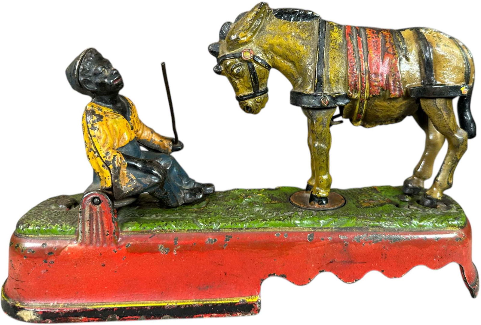 SPISE A MULE MECHANICAL BANK - BENCH: 384. SPISE A MULE MECHANICAL BANK - BENCH | J&E Stevens Co. | CULTURAL DISCLAIMER: Certain antique and vintage items in this sale include imagery or themes that reflect racial stereotypes now