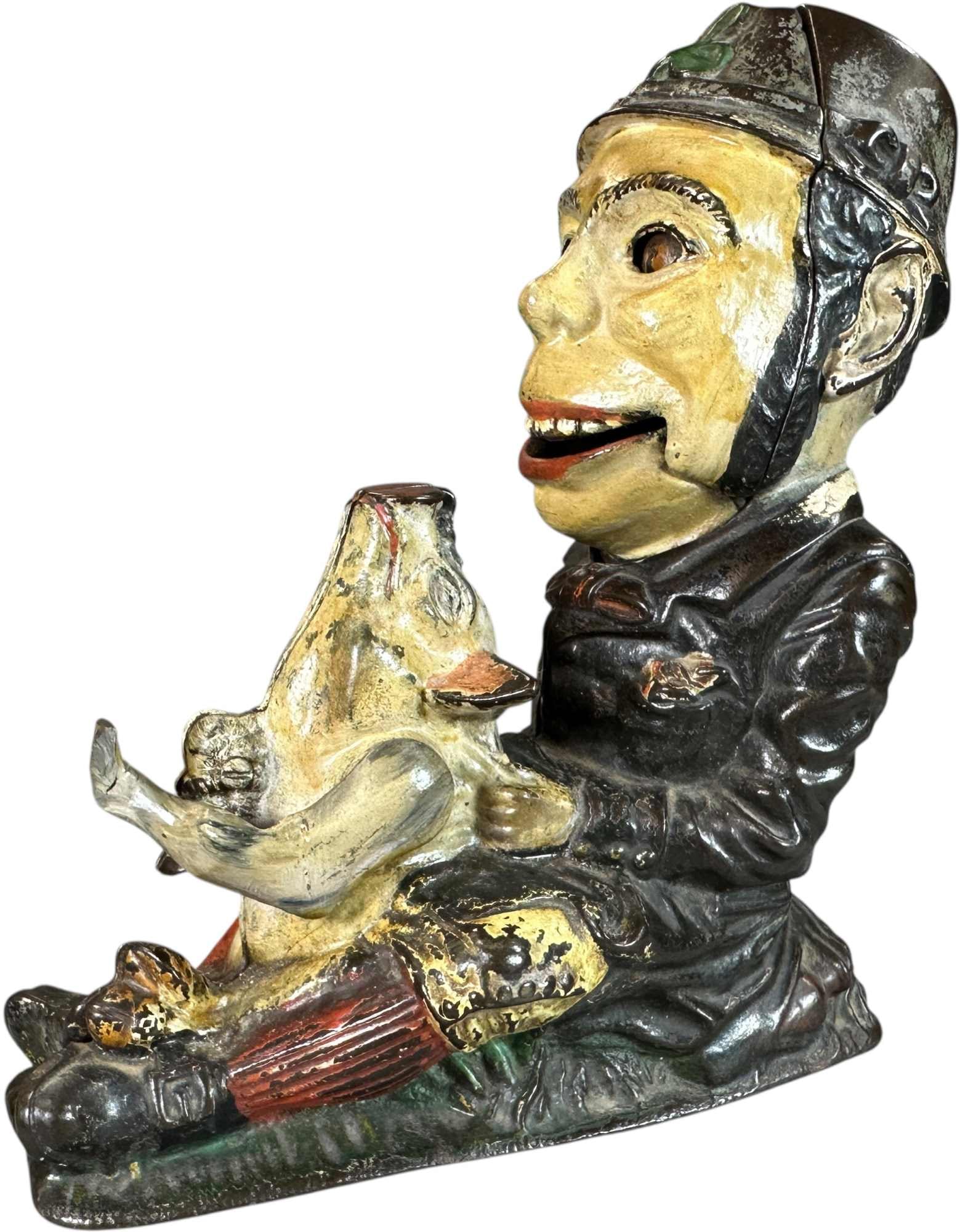 PADDY & THE PIG MECHANICAL BANK: 387. PADDY & THE PIG MECHANICAL BANK | J&E Stevens Co. | CULTURAL DISCLAIMER: Certain antique and vintage items in this sale include imagery or themes that reflect racial stereotypes now recognized
