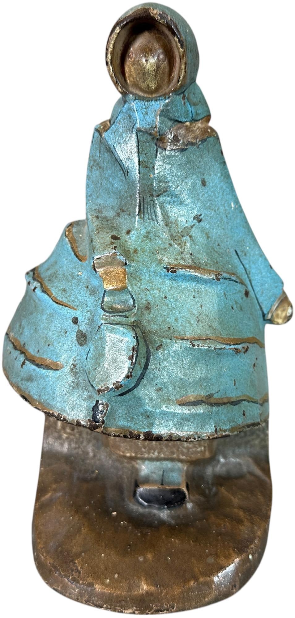 HUBLEY OLD FASHIONED LADY DOORSTOP: 412. HUBLEY OLD FASHIONED LADY DOORSTOP | "Hubley 296". | 8.5" h. | Will brighten with a cleaning, (Excellent Condition) | $200 - $400