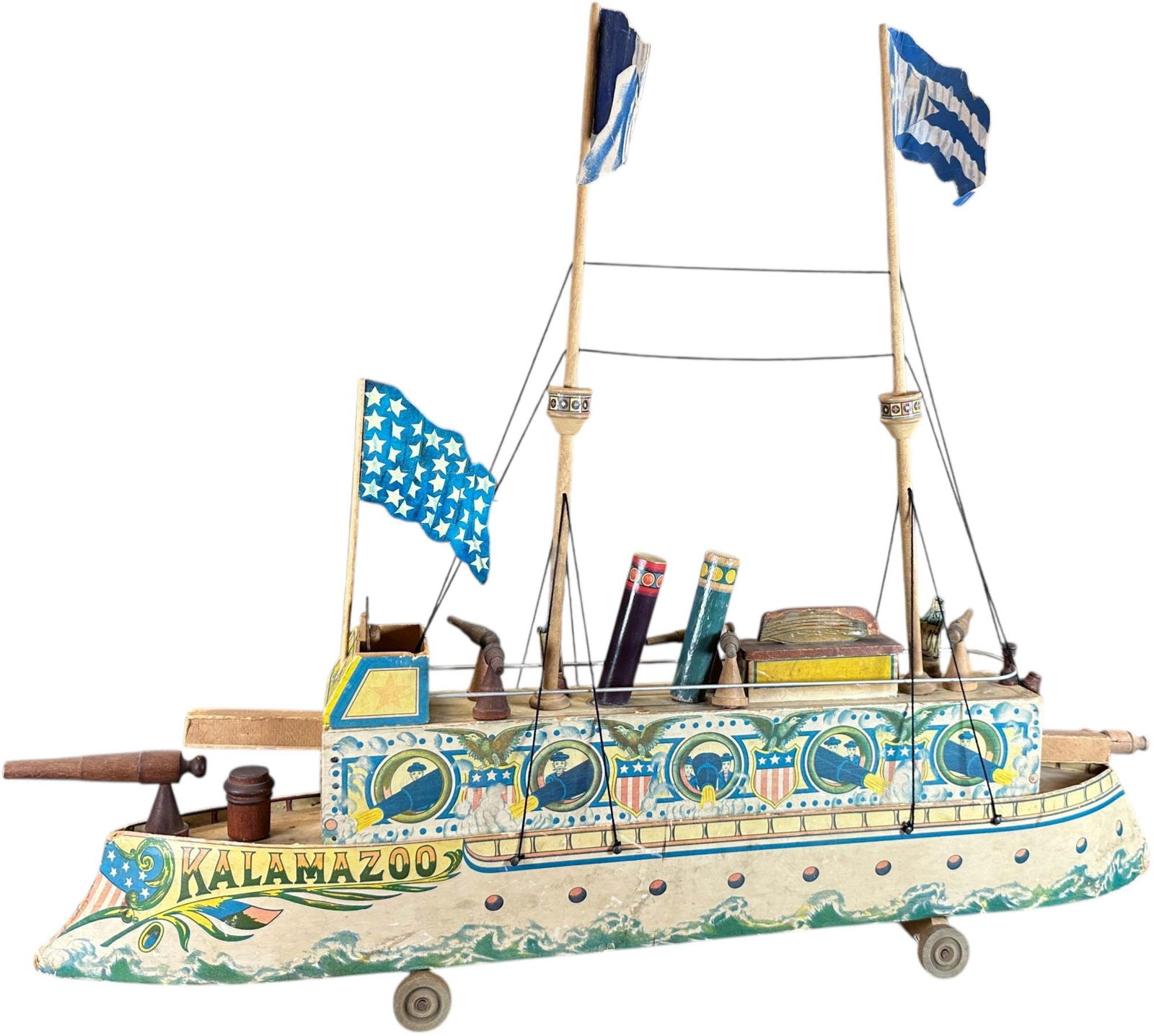 BLISS BATTLESHIP KALAMAZOO: 427. BLISS BATTLESHIP KALAMAZOO | Provenance: Richard Mueller Collection. | 32 " l. | Aside from steering wheel, front flag and one mast, the boat is all original with two sailor figures, (Excellent C