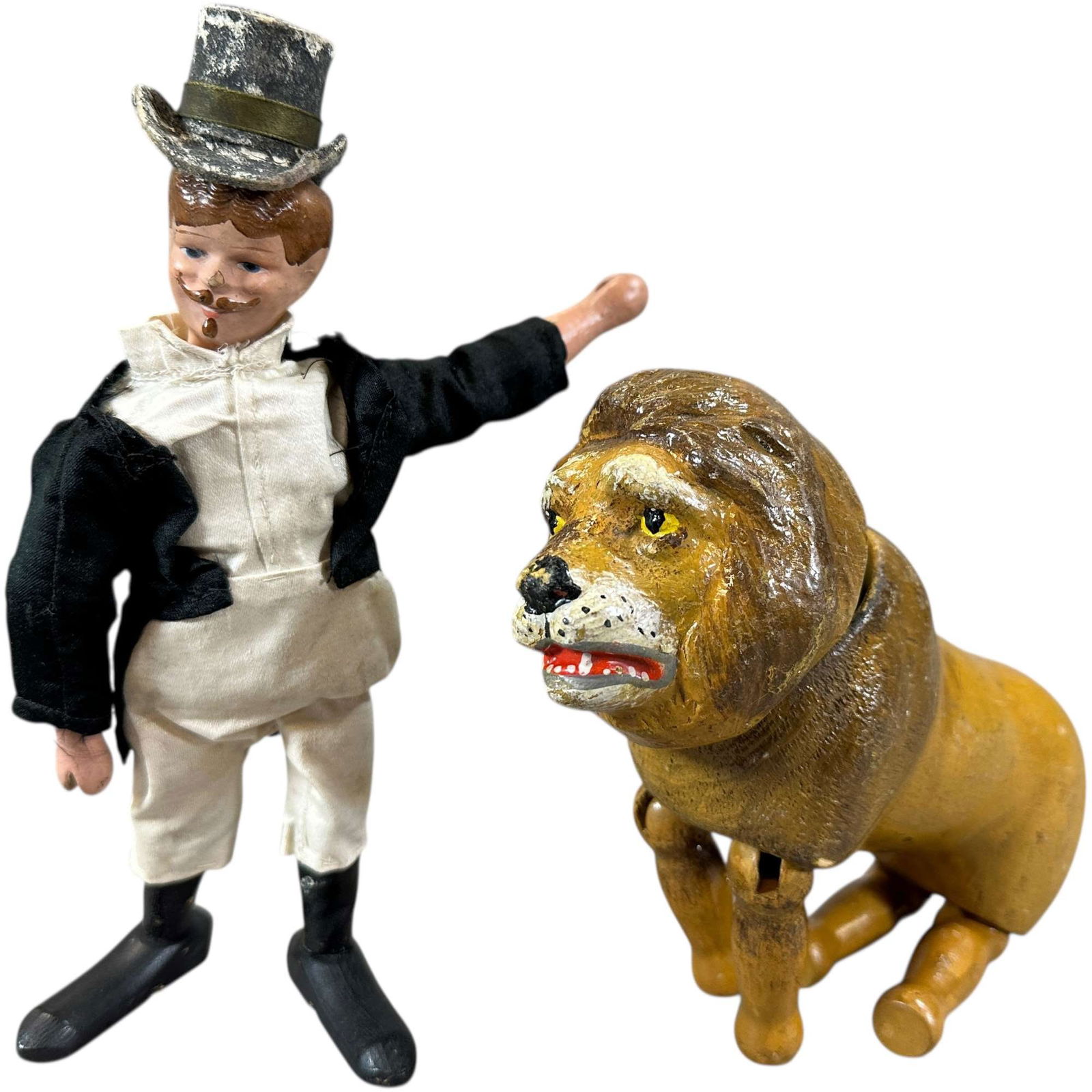 SCHOENHUT RINGMASTER &LION: 483. SCHOENHUT RINGMASTER &LION | 8.5" h. | Wear to ringmaster hat, (Excellent Condition) | $150 - $300