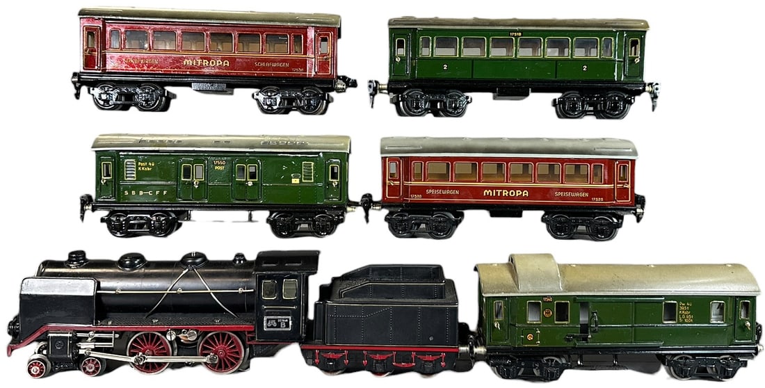 MARKLIN O GAUGE CONTINENTAL PASSENGER TRAIN SET: 2. MARKLIN O GAUGE CONTINENTAL PASSENGER TRAIN SET | O gauge, electric. | 10" l. loco | Minor touch-up to small areas on postal car, otherwise (Excellent Condition) | $600 - $1,200