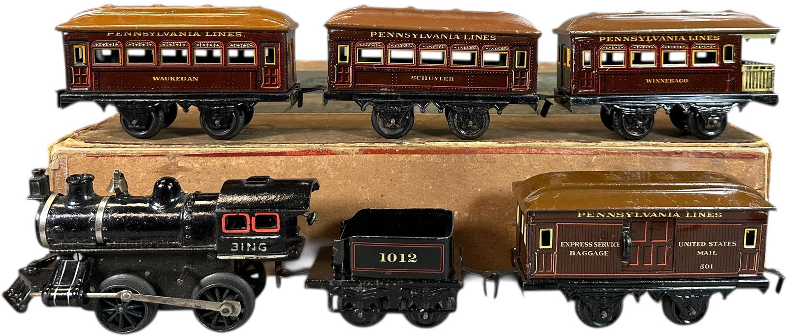 BOXED BING PENNSYLVANIA PASSENGER TRAIN SET: 3. BOXED BING PENNSYLVANIA PASSENGER TRAIN SET | O gauge, clockwork. | 7" l. loco | (Excellent Condition) | $300 - $600