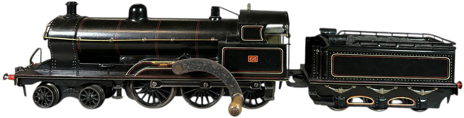 RARE MARKLIN EXPERIMENT 4-6-0 LOCOMOTIVE: 5. RARE MARKLIN EXPERIMENT 4-6-0 LOCOMOTIVE | Gauge 1, clockwork. | 14.5" l. loco | Restored, (Excellent Condition) | $1,000 - $2,000