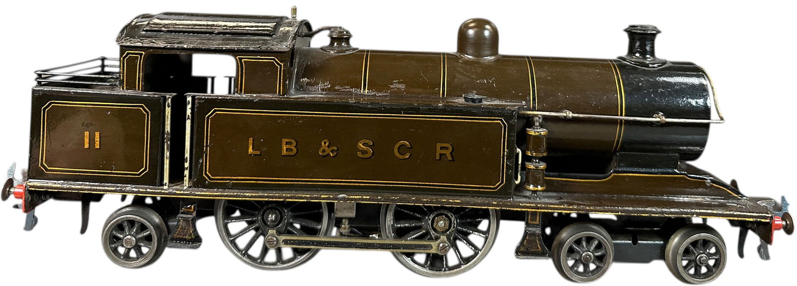 MARKLIN LBSCR TANK LOCOMOTIVE: 10. MARKLIN LBSCR TANK LOCOMOTIVE | Gauge 1, clockwork. Ex: The Tony Cuff UK Collection. | 15" l. loco | Some areas of restoration masterfully blended under lacquer, displays in (Excellent to Pristine