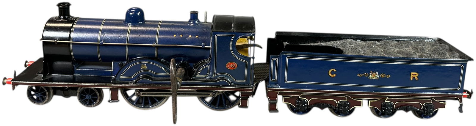 BING FOR BASSETT LOWKE CALEDONIAN LOCOMOTIVE: 15. BING FOR BASSETT LOWKE CALEDONIAN LOCOMOTIVE | Gauge 1, clockwork. Ex: The Tony Cuff UK Collection. | 11.5" l. loco | Tender restored, loco has some areas of restoration, displays in (Excellent Co
