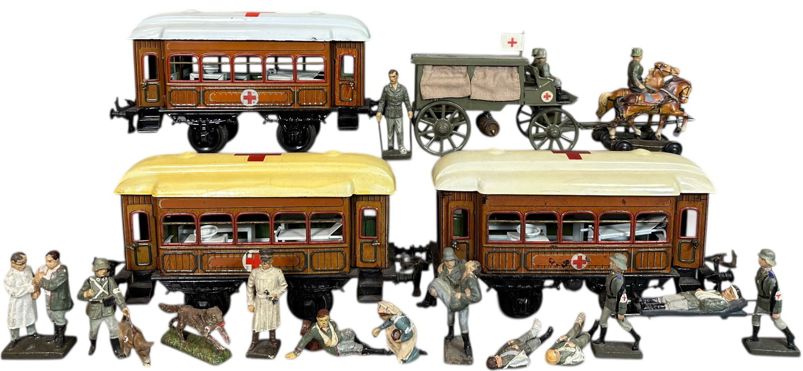BING HOSPITAL CARS W/ WAGON & FIGURES: 17. BING HOSPITAL CARS W/ WAGON & FIGURES | Gauge 1, litho. | 8" l. | (Very Good to Excellent Condition) | $300 - $600