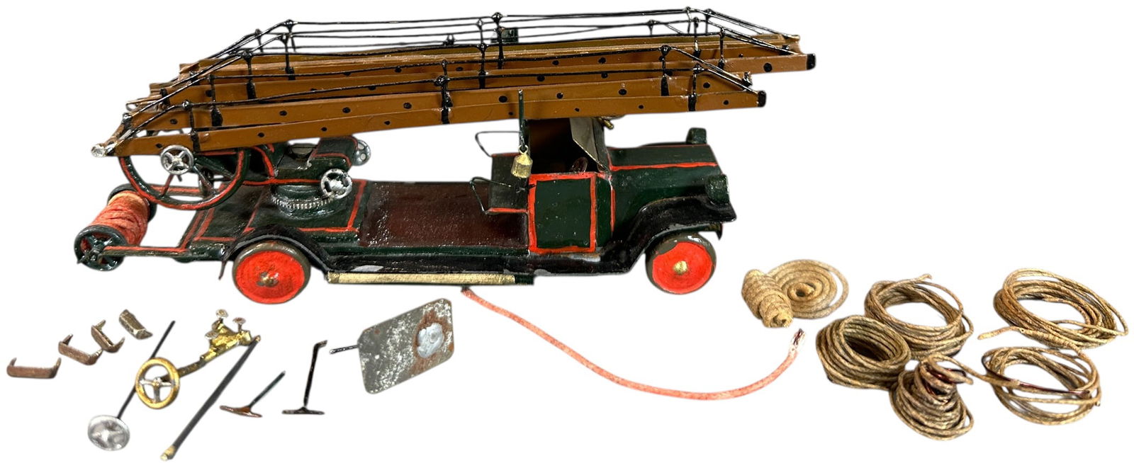 RARE PAUL PATZSCH LADDER TRUCK MODEL: 19. RARE PAUL PATZSCH LADDER TRUCK MODEL | Tinplate firetruck made by the renowned model maker Paul Patzsch. Patzsch began making lead and tin models in 1908 and supplied many for the Dresden toy shop