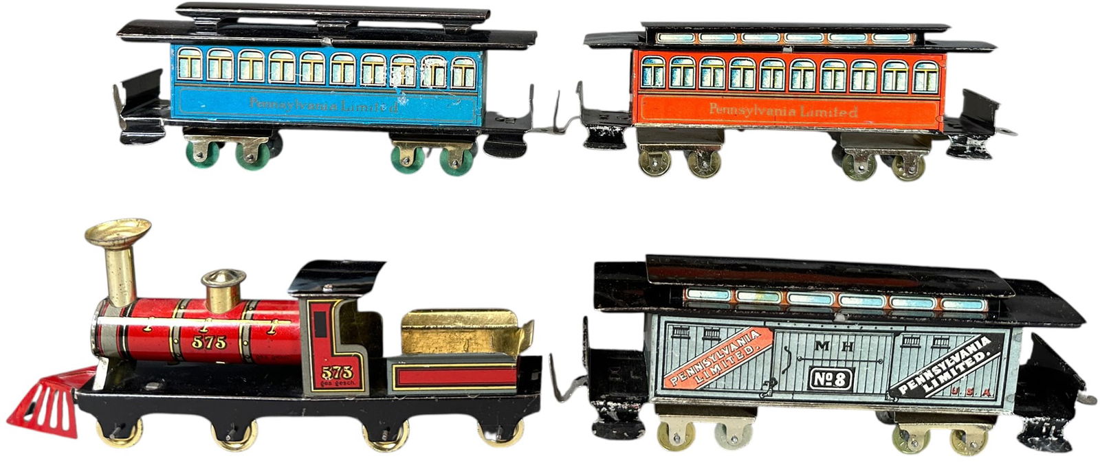 PENNSYLVANIA LIMITED PENNY TOY PASSENGER TRAIN SET: 47. PENNSYLVANIA LIMITED PENNY TOY PASSENGER TRAIN SET | Provenance: The Chuck Ehlers Hess Collection. | 7" l. | (Excellent to Pristine Condition) | $400 - $800