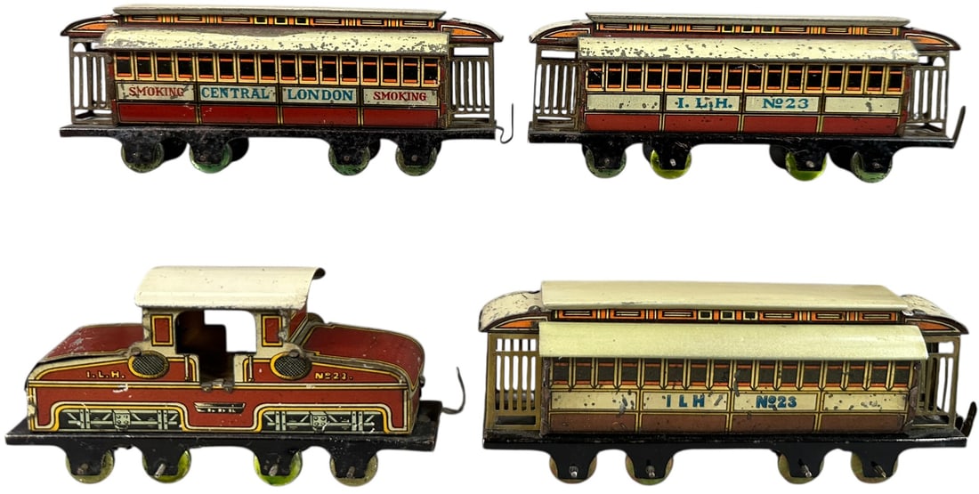 RARE HESS CENTRAL LONDON RAILWAY TRAIN SET: 52. RARE HESS CENTRAL LONDON RAILWAY TRAIN SET | Provenance: The Chuck Ehlers Hess Collection. | 5" l. loco | One coach has paint enhancement to roof, otherwise (Very Good to Excellent Condition) with