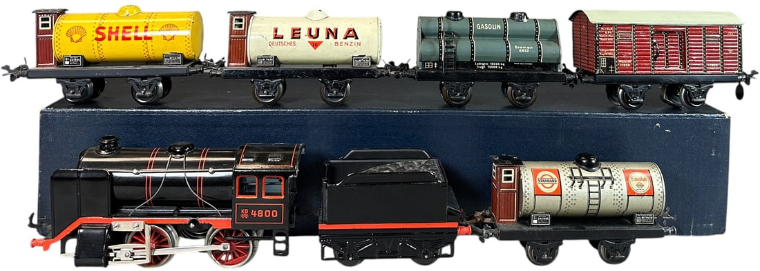 KARL BUB FREIGHT TRAIN SET: 56. KARL BUB FREIGHT TRAIN SET | O gauge, wind-up. | 8" l. loco | Overall (Excellent Condition) | $250 - $500