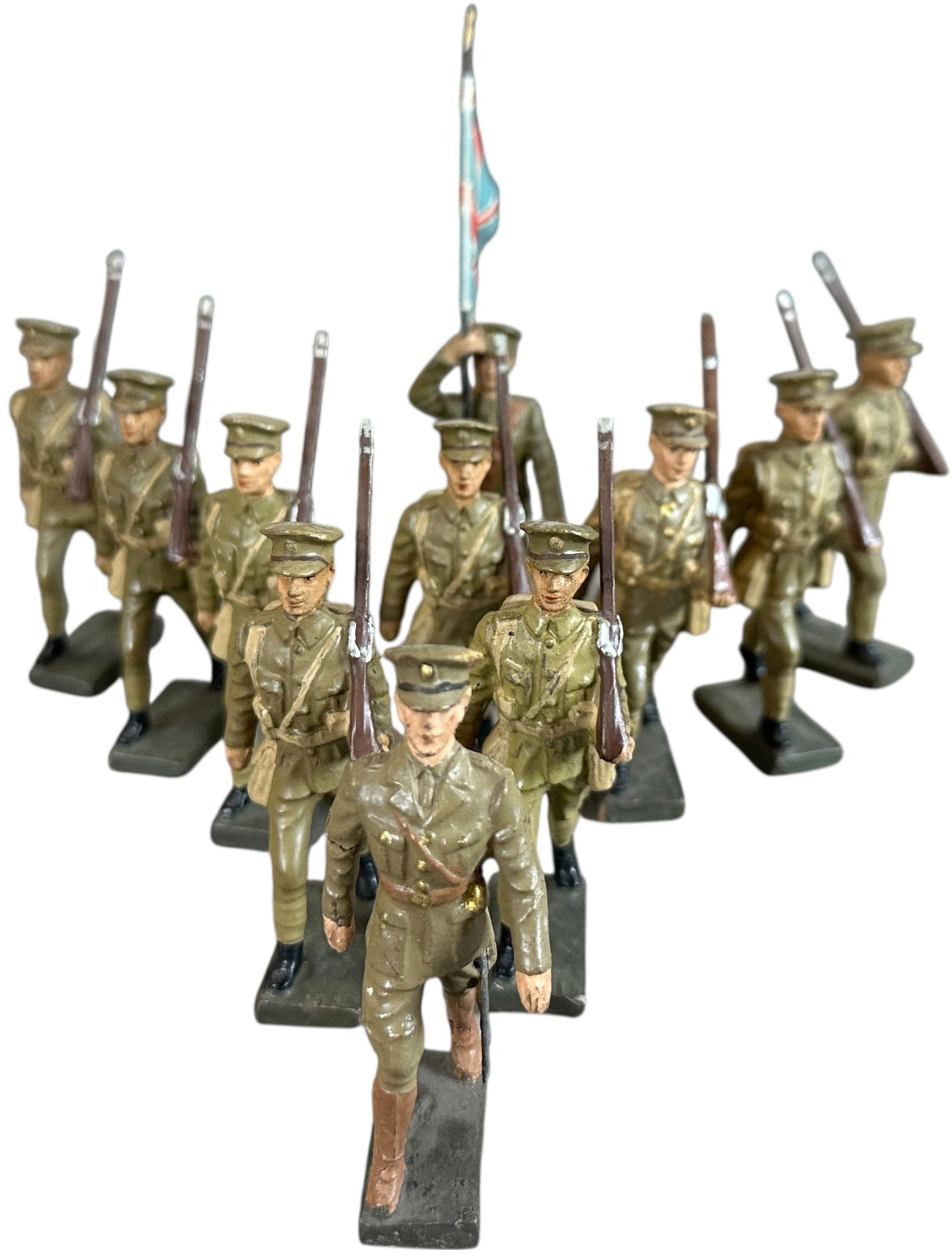 LINEOL BRITISH EXPEDITIONARY SOLDIERS: 74. LINEOL BRITISH EXPEDITIONARY SOLDIERS | Nine marching figures including flag bearer and officer, scarce figures, one soldier has worn arm. From the Italian collection of Steno Tonelli. | 75 mm | (