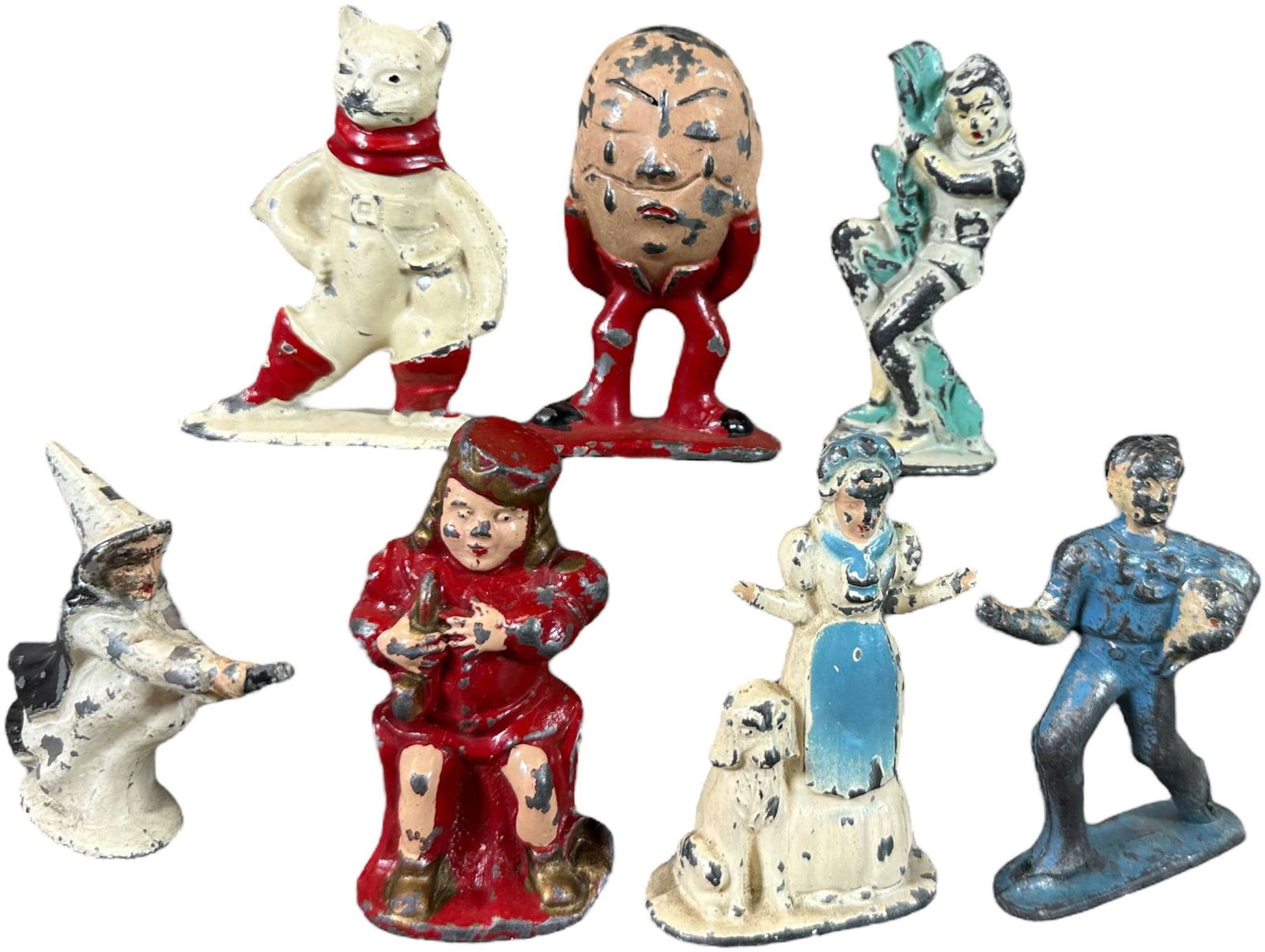 TOMMY TOY SEVEN PIECE FIGURE SET: 85. TOMMY TOY SEVEN PIECE FIGURE SET | Includes witch. | 2.5" h. | (Very Good Condition) | $100 - $200