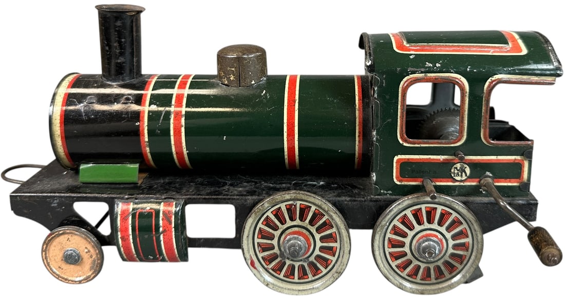 HESS FLYWEEL LOCOMOTIVE: 96. HESS FLYWEEL LOCOMOTIVE | Provenance: The Chuck Ehlers Hess Collection. | 8.5" l. loco | (Very Good to Excellent Condition) | $200 - $400
