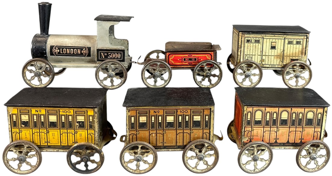 LARGE EARLY HESS FLOOR TRAIN: 99. LARGE EARLY HESS FLOOR TRAIN | Provenance: The Chuck Ehlers Hess Collection. | 6" l. loco | Paper labels on loco and tender replaced, loco has some touch-up, one car missing one paper label, overa