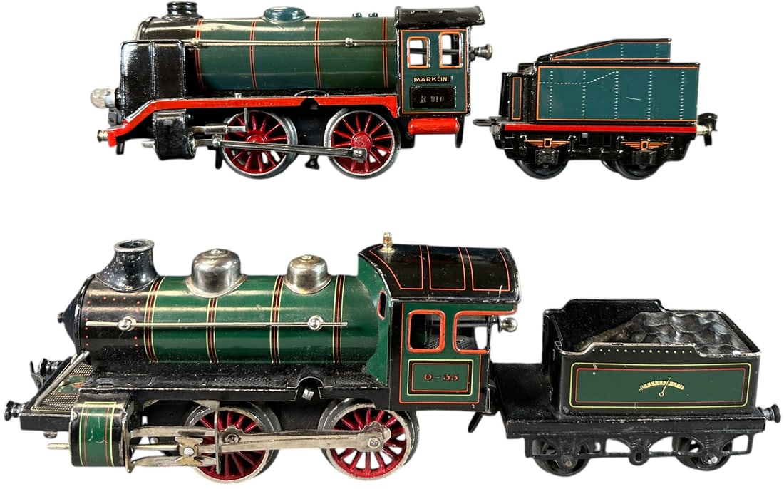 BING & MARKLIN WIND-UP LOCOMOTIVES: 102. BING & MARKLIN WIND-UP LOCOMOTIVES | O gauge. | 8.5" l. loco | Minor touch-up to Marklin engine, otherwise (Excellent Condition) | $300 - $600