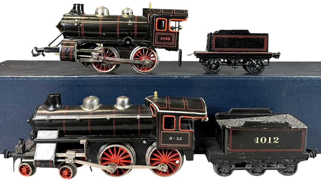 TWO BING CLOCKWORK LOCOMOTIVES: 104. TWO BING CLOCKWORK LOCOMOTIVES | O gauge. | 9.5" l. loco | (Excellent Condition) | $300 - $600