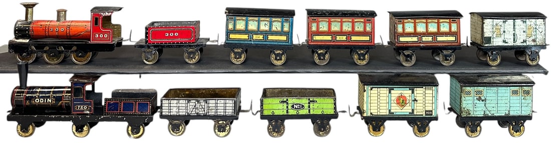 TWO HESS PASSENGER TRAIN SETS: 111. TWO HESS PASSENGER TRAIN SETS | Provenance: The Chuck Ehlers Hess Collection. | 5" l. loco | Smokestack replaced, overall (Very Good to Excellent Condition) | $300 - $600