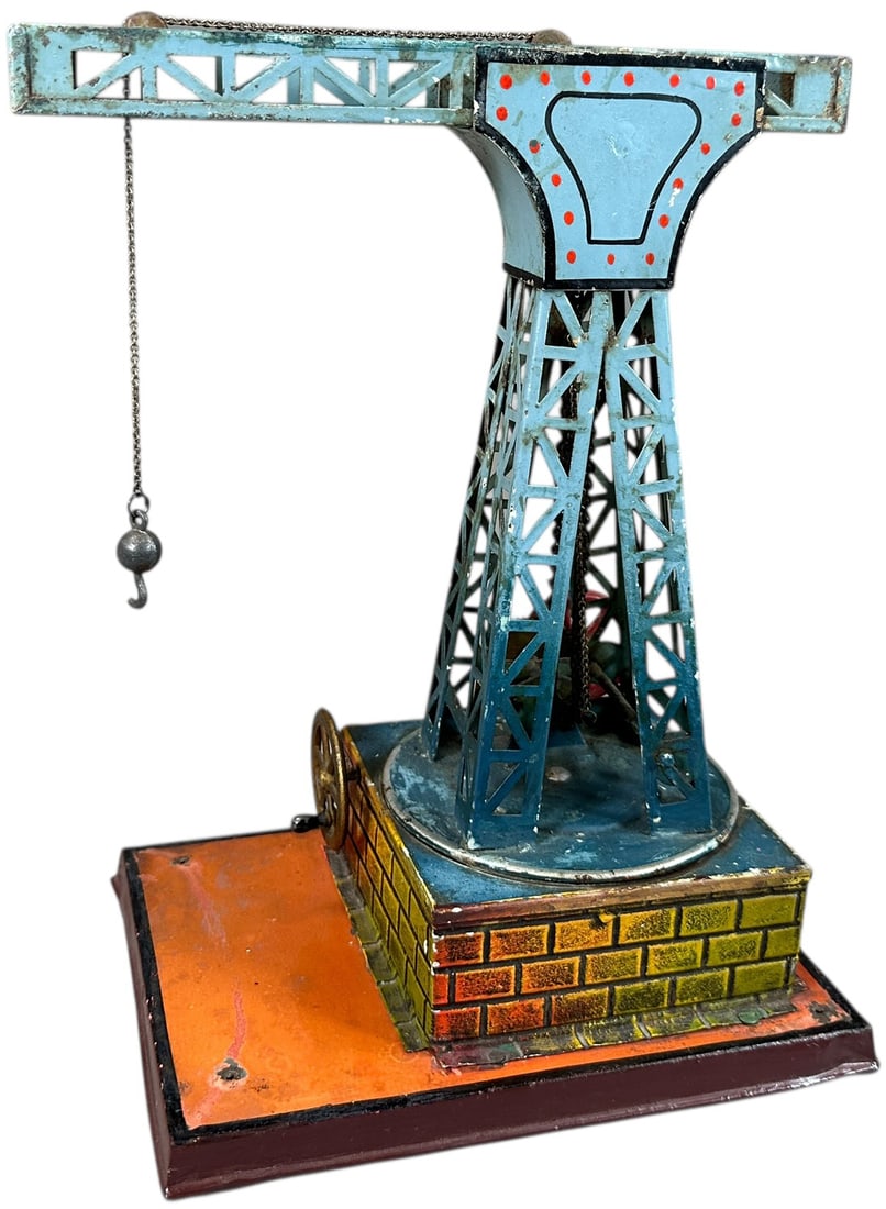 RARE DOLL CO. DOCKSIDE CRANE: 119. RARE DOLL CO. DOCKSIDE CRANE | Live steam accessory. | 11" h. | Some touch-up to areas around bottom of crane, larger base is added, overall (Very Good to Excellent Condition) | $300 - $500
