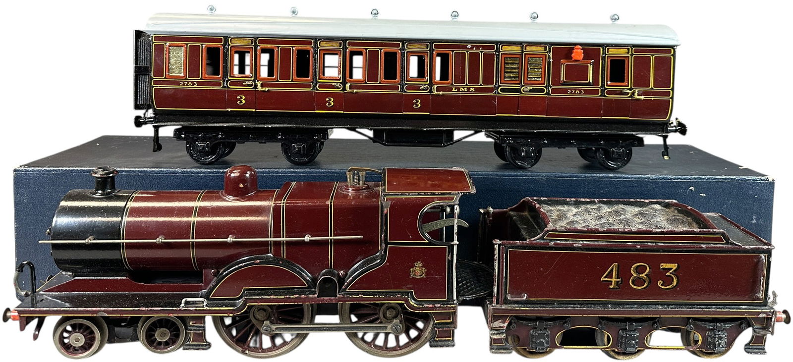 CLOCKWORK BING FOR BASSETT LOWKE LOCO & COACH: 128. CLOCKWORK BING FOR BASSETT LOWKE LOCO & COACH | Gauge 1, clockwork, hand painted loco and litho coach. | 12" l. loco | Coach roof is repainted while the lithography is complete and bright, overal