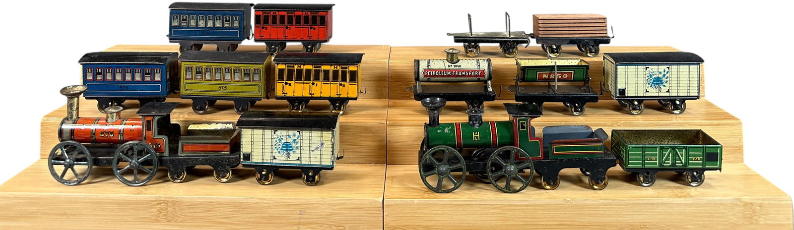 HESS LITHO TRAIN SETS: 142. HESS LITHO TRAIN SETS | Provenance: The Chuck Ehlers Hess Collection. | 6" l. loco | Ranging from (Very Good Condition) to (Excellent Condition) | $400 - $800