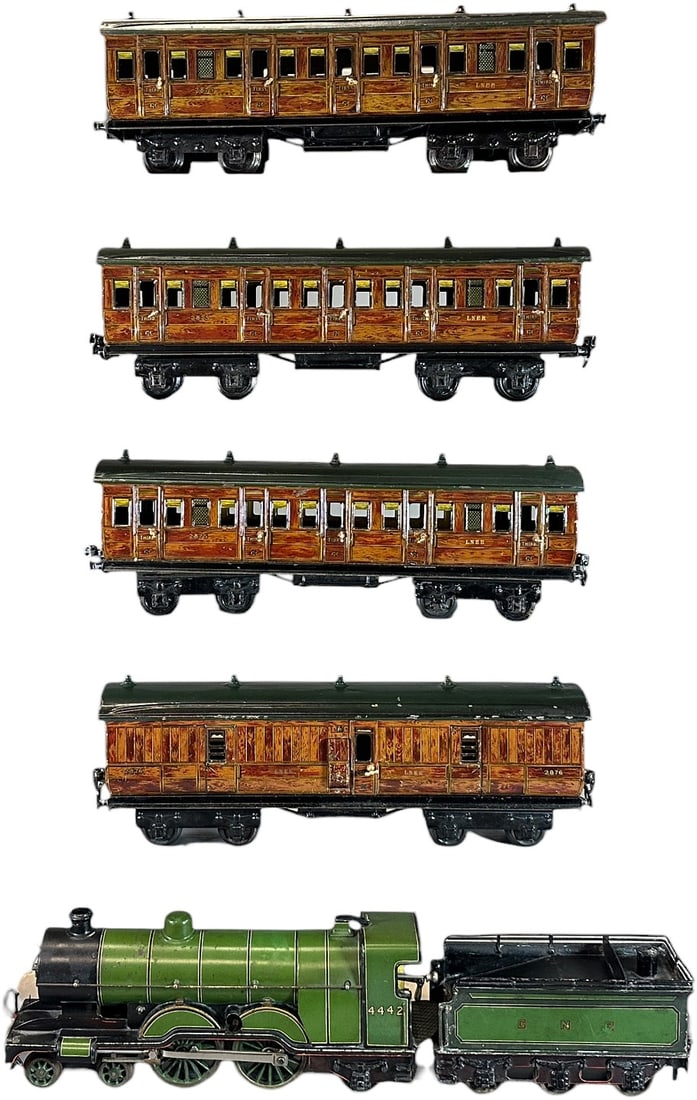 MARKLIN ATLANTIC LOCO & GNR PASSENGER CARS: 160. MARKLIN ATLANTIC LOCO & GNR PASSENGER CARS | Clockwork, gauge 1, hand painted loco with litho cars. | 13.5" l. loco | Some minor touch-up to engine, (Very Good to Excellent Condition) | $800 - $1