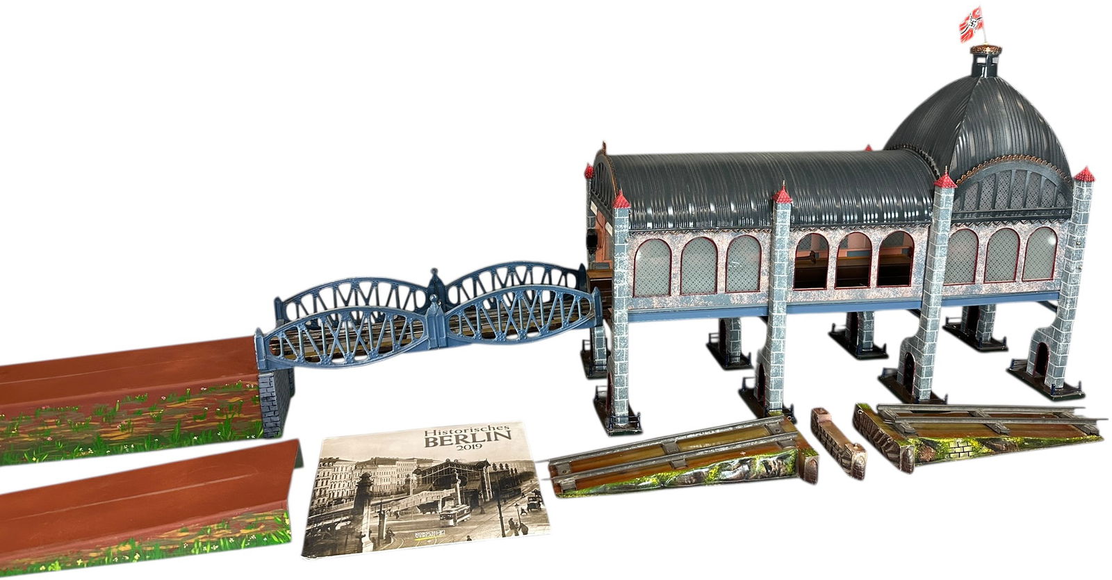 IMPRESSIVE TINPLATE BERLIN ELEVATED STATION: 166. IMPRESSIVE TINPLATE BERLIN ELEVATED STATION | Tinplate, hand painted, features real etched glass, made in small quantities by Bottger of Germany in the 1960's. Suitable for gauge 1 or 2, includes