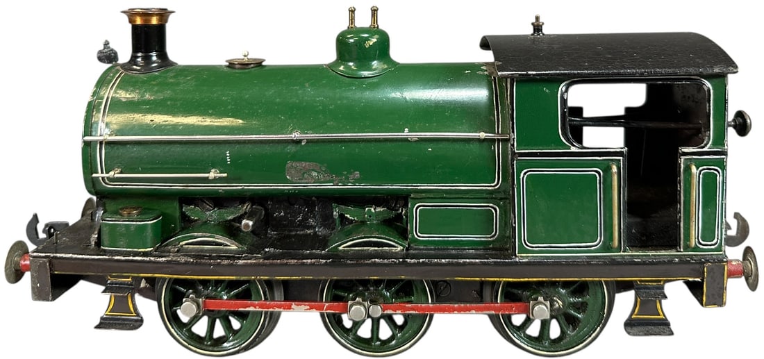 CUSTOMIZED CARETTE PECKETT LOCOMOTIVE: 170. CUSTOMIZED CARETTE PECKETT LOCOMOTIVE | Clockwork, gauge 1, hand painted. | 10" l. loco | (Excellent Condition) | $250 - $500