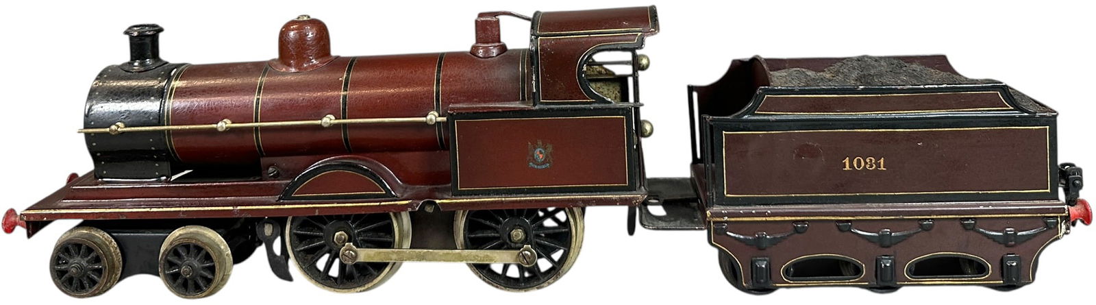 MARKLIN MIDLAND RAILWAY LOCOMOTIVE: 174. MARKLIN MIDLAND RAILWAY LOCOMOTIVE | Gauge 1, clockwork. | 11.5" l. loco | (Excellent Condition) | $400 - $800