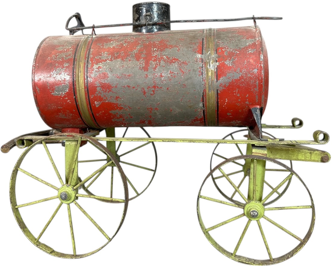 EARLY GERMAN OVERSIZED WATER WAGON: 187. EARLY GERMAN OVERSIZED WATER WAGON | Hand painted. | 18" l. | (Very Good Condition) | $400 - $800