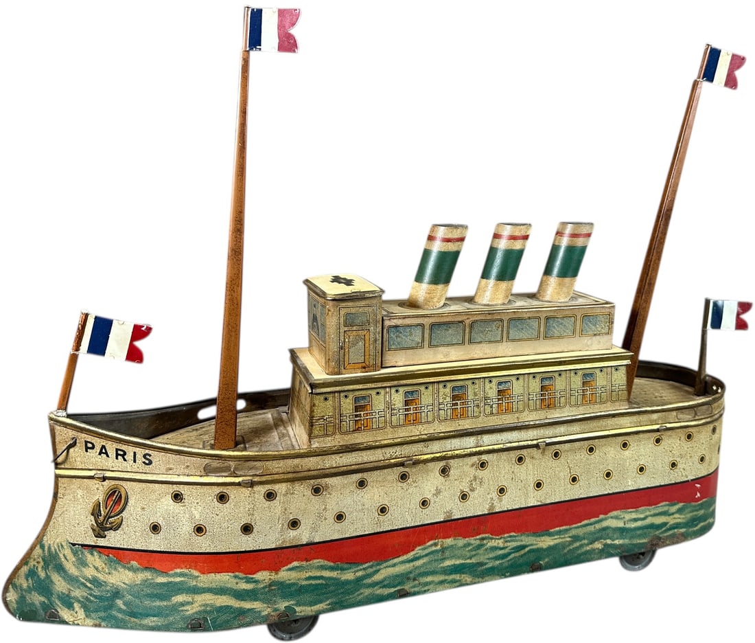 LARGE PARIS OCEAN LINER BISCUIT TIN: 188. LARGE PARIS OCEAN LINER BISCUIT TIN | Netherlands, circa 1910, J. Bekkers & Zoon, a scarce and very collectible piece. Ex: The Tony Cuff UK Collection. | 23" l. | Typical replacement masts and
